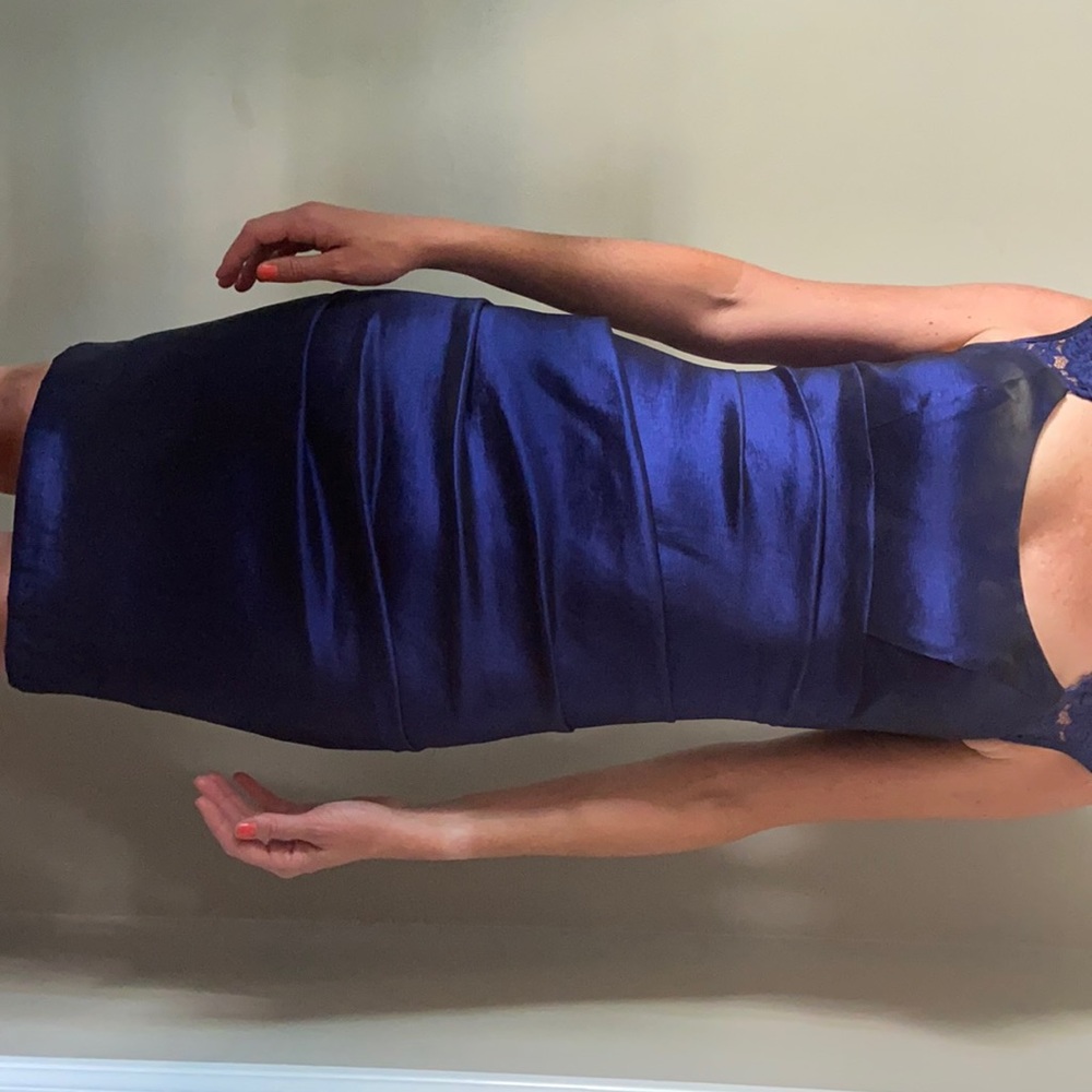 Blue cocktail dress with lace shoulders